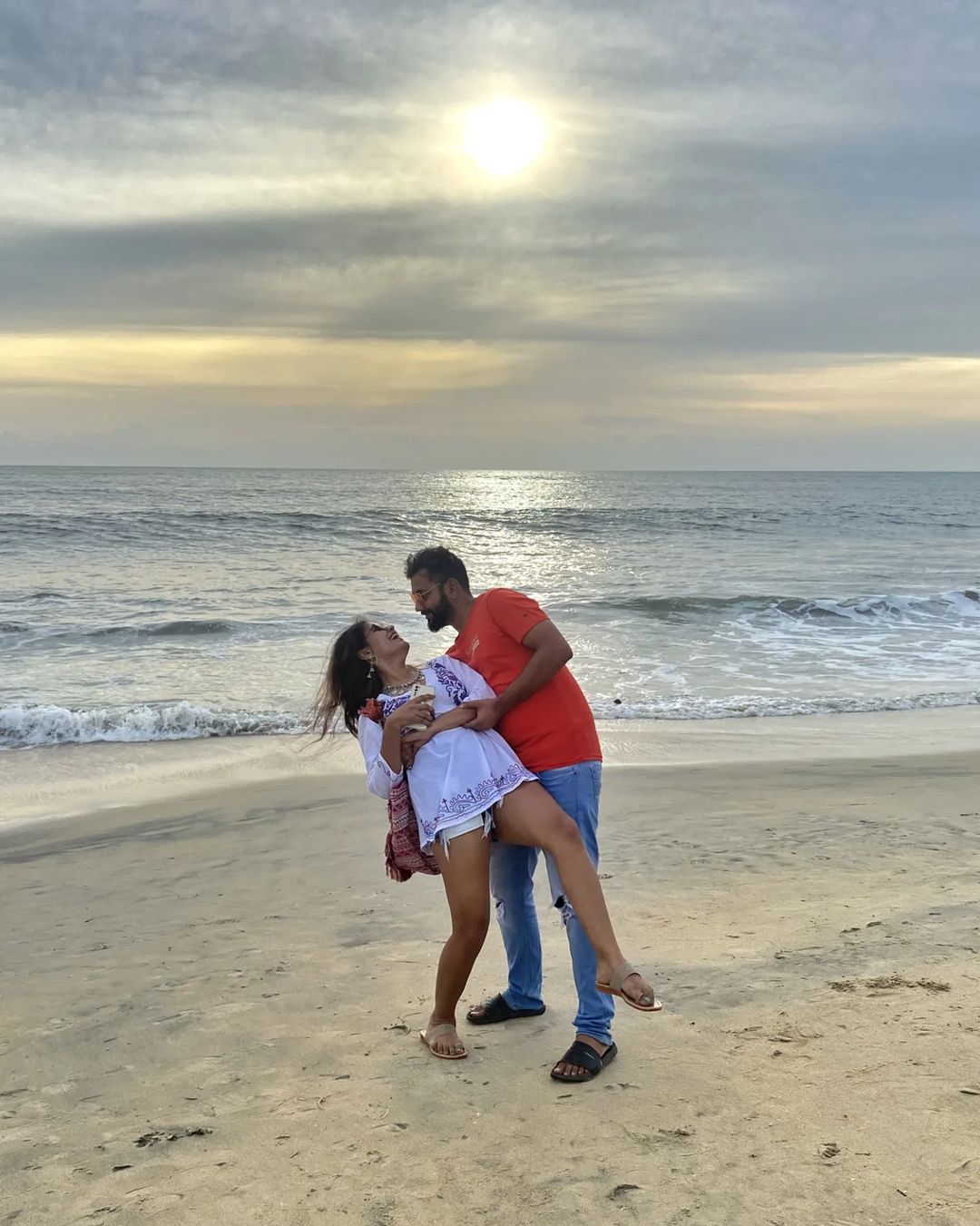 Travel Connection Kerala Tour client at beach
